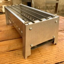 Spiedini Saté-bbq Bali 40 Mini - Kleine, Smalle Houtskoolbarbecue Met Horizontaal Rooster Voor Sate Of Andere Spiesjes - 40 Cm Lang, 11 Cm Breed, 14 Cm Hoog - Ideaal Voor Tuin- Of Open Haard, Of Balkon - Materiaal: Gealuminiseerd Ijzer -Barbecue Series Winkel 1200x1200 710